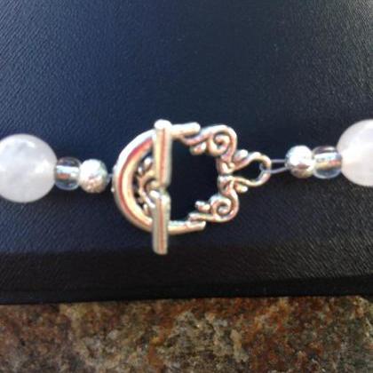 Rose Quartz Beads And Sterling Silver Bead..