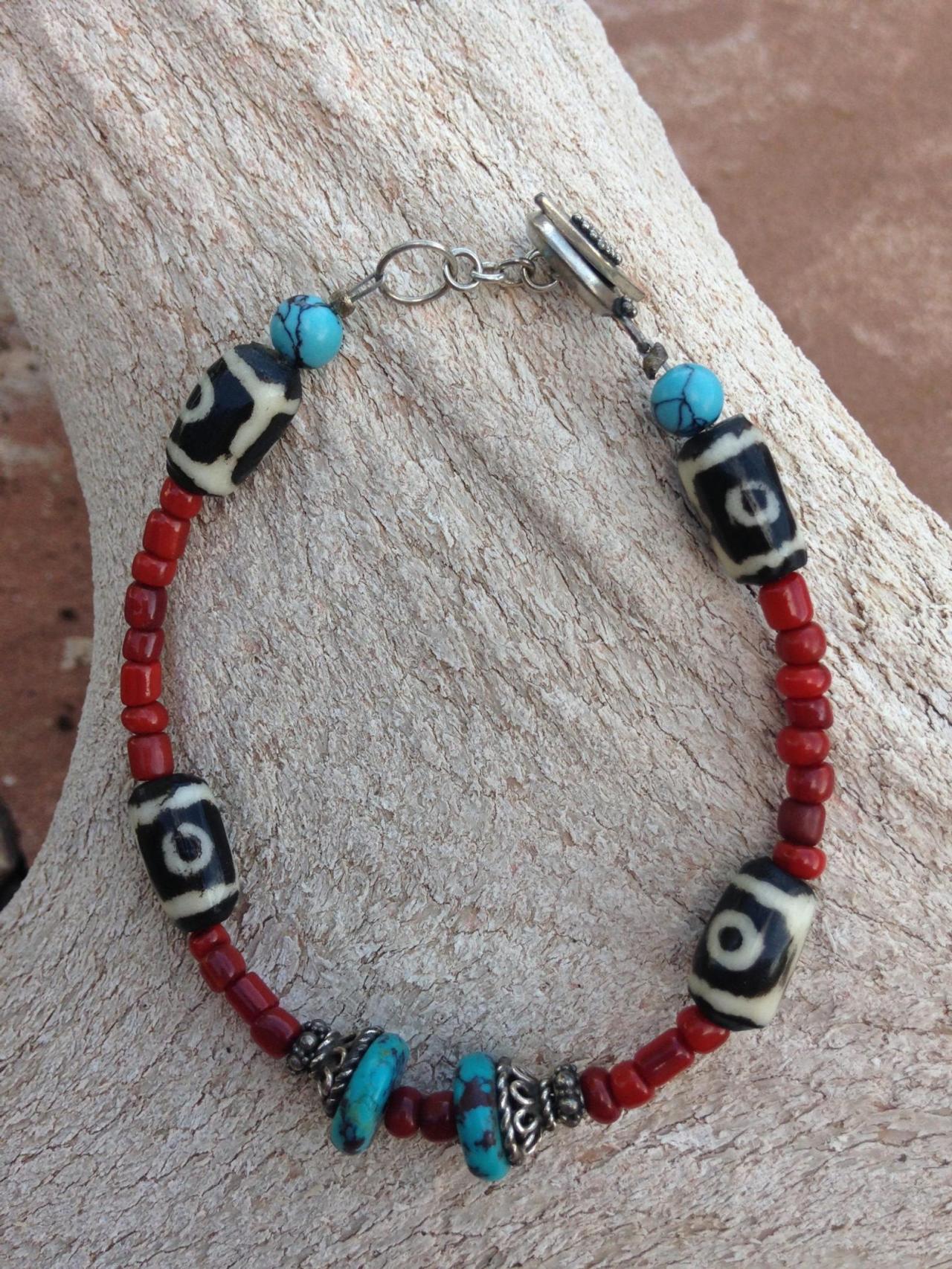 7 3/4 in Coral turquoise and painted wooden bead bracelet