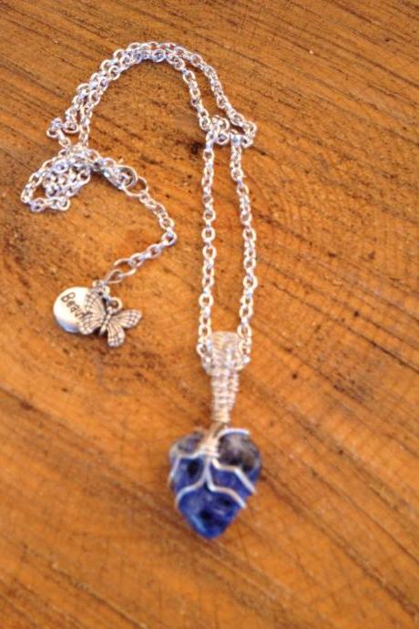 Sodalite stone wire wrapped pendant on silver chain
